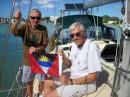 Welcome to Antigua!: Captain Pete & Bob get the honors of raising the courtesy flag for the Country of Antigua & Barbuda on the first working day of 2017 in Jolly Harbor Marina!  They even shaved for the occasion!